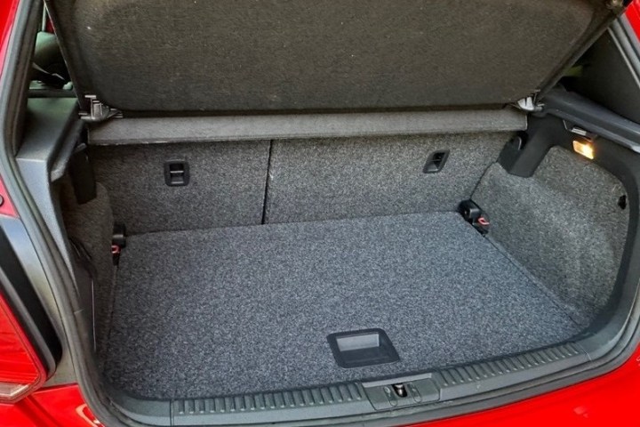 a piece of luggage sitting on top of a car