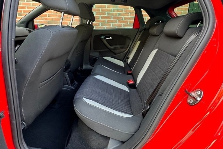 a bag of luggage sitting on top of a car