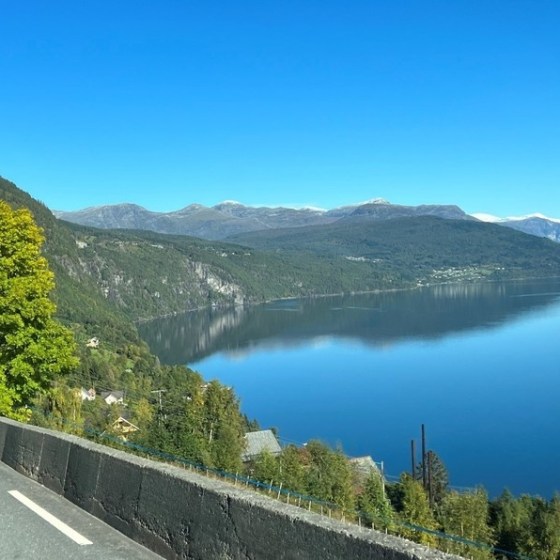 a view of a body of water with a mountain in the background