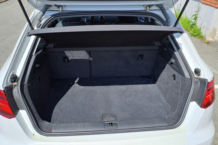 a piece of luggage sitting on top of a car